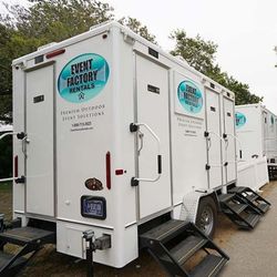 Angled view of luxury restroom trailer rental from Event Factory Rentals.