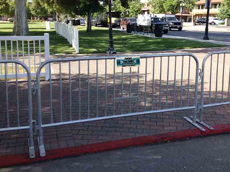 Crowd barricades and temp fence rented from Event Factory Rentals for outdoor event.