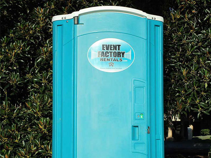 Event Factory Rentals provding Standard portable toilet rental for outdoor event.