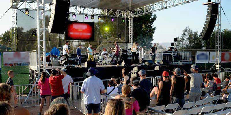 Fans watching a music performance around our event rentals for concerts near Armona, California.