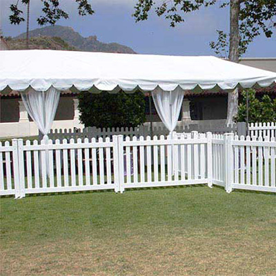 White vinyl picket fencing rented for a concert in Santa Clarita, CA.