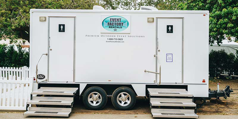 White luxury restroom trailer, one of our toilet rentals near Monterey, California.